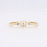 Load image into Gallery viewer, East-West Oval Diamond Ring with Diamond Trim in Yellow Gold
