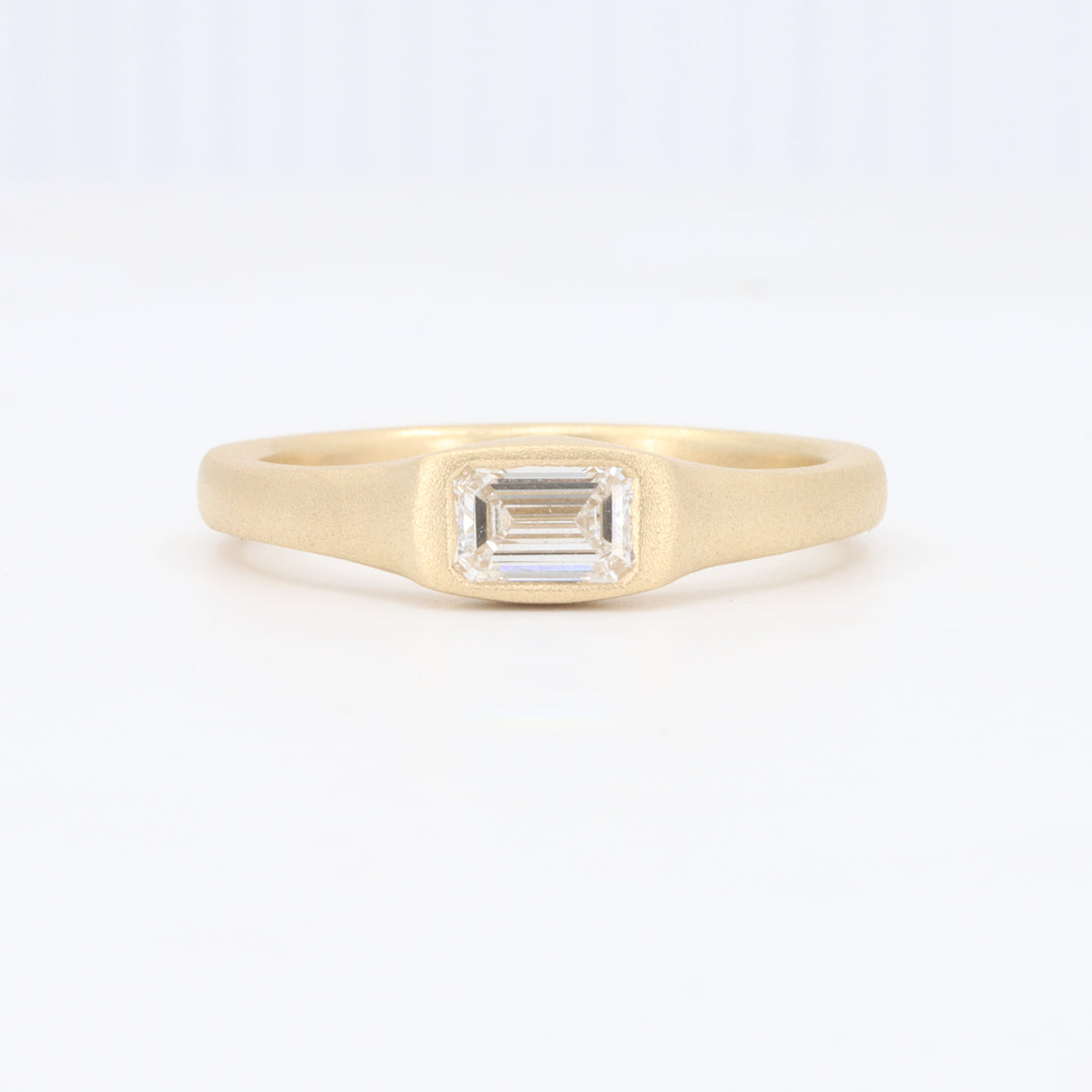 Emerald Cut Diamond Signet Ring in Sandblasted Yellow Gold