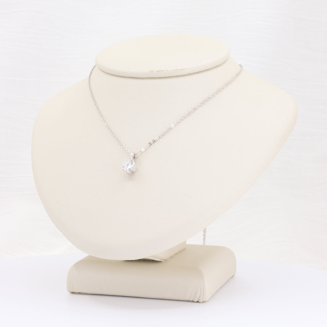 Lab-grown diamond solitaire pendant in white gold on an 18-inch chain; 0.57ct, KIZER-CUMMINGS JEWELERS