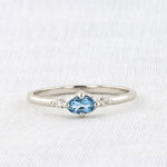 Load image into Gallery viewer, East-West Oval Aquamarine Ring with Diamond Trim in White Gold
