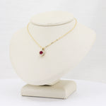 Load image into Gallery viewer, Ruby and Diamond Halo Pendant, 0.32ct Ruby with 0.18cttw Diamond Halo in 14K Yellow Gold, 18 inch Chain - Kizer Cummings Jewelers