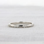 Load image into Gallery viewer, Spaced Diamond Wedding Band in White Gold
