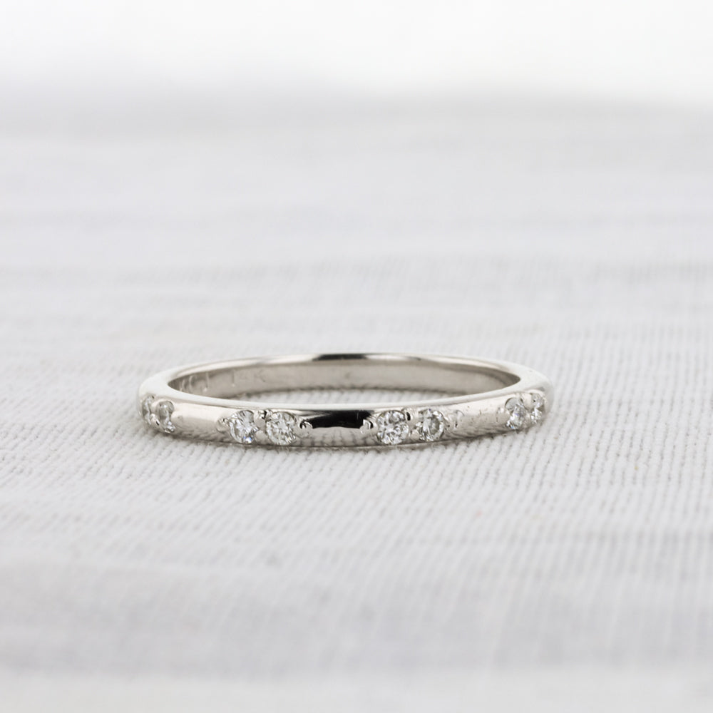 Spaced Diamond Wedding Band in White Gold