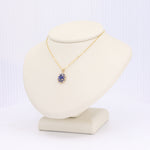 Load image into Gallery viewer, Sapphire Halo Pendant in Yellow Gold
