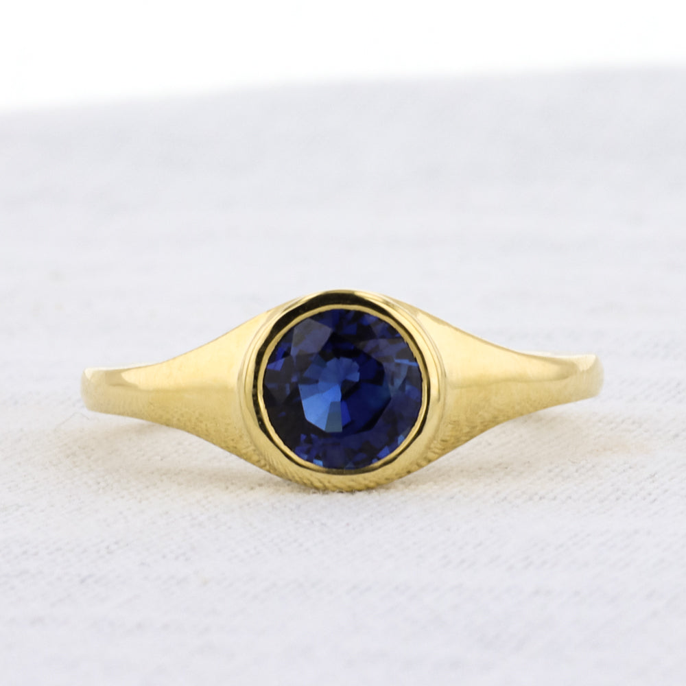 Bezel Set Blue Sapphire Ring in 18K Yellow Gold