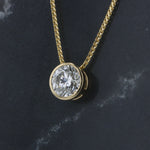 Load image into Gallery viewer, Bezel Diamond Slide Necklace in Yellow Gold
