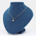 Load image into Gallery viewer, Diamond and Sapphire Halo Pendant, 0.37ct Oval Diamond and 0.28cttw Sapphires in 14K Yellow Gold, 18 inch Chain