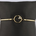 Load image into Gallery viewer, Articulated Bangle Bracelet With Diamond Circle Center in Yellow Gold
