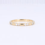 Load image into Gallery viewer, Spaced Diamond Wedding Band in Yellow Gold

