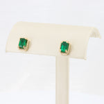 Load image into Gallery viewer, Emerald Cut Emerald Beaded Halo Stud Earrings, 1.08cttw in 14K Yellow Gold - Kizer Cummings Jewelers