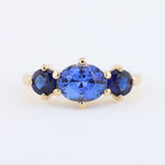 Load image into Gallery viewer, Three Stone Sapphire Ring with East West Set Oval Center set in Yellow Gold
