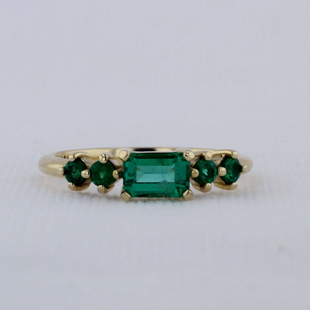 East-West Emerald-cut Emerald Ring in Yellow Gold