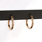 Load image into Gallery viewer, Huggie Earrings in Rose Gold