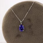 Load image into Gallery viewer, Oval Tanzanite Solitaire Necklace in 14K White Gold
