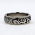 Load image into Gallery viewer, Storm&#39;s Eye Pattern Damascus Steel Ring
