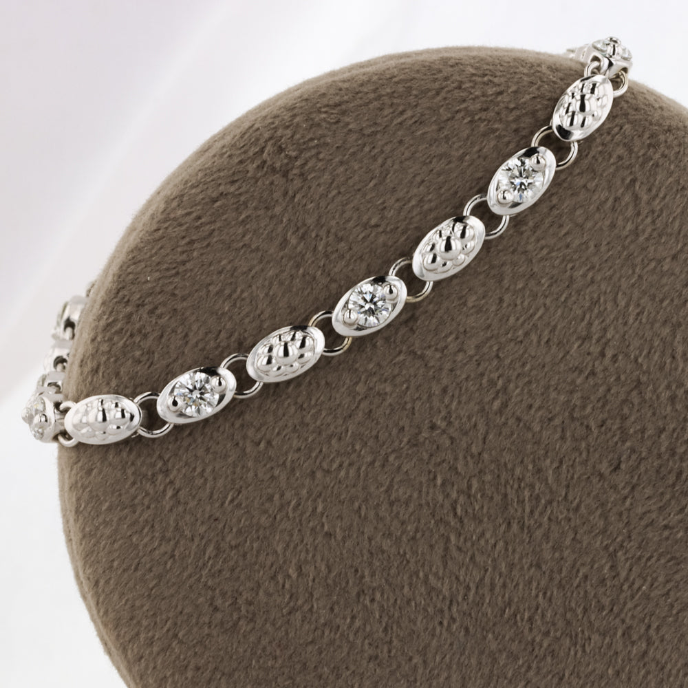 Alternating Floral and Diamond Link Tennis Bracelet in White Gold
