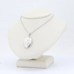 Load image into Gallery viewer, Floral Embossed Oval Locket in Sterling Silver
