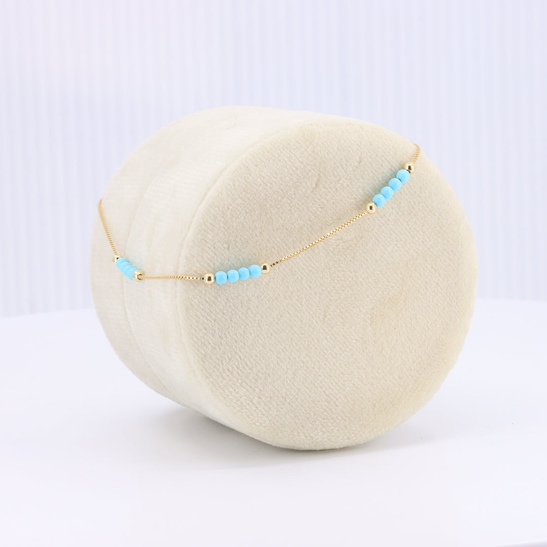 Stationed Mini Turquoise Bead Bracelet in Yellow Gold