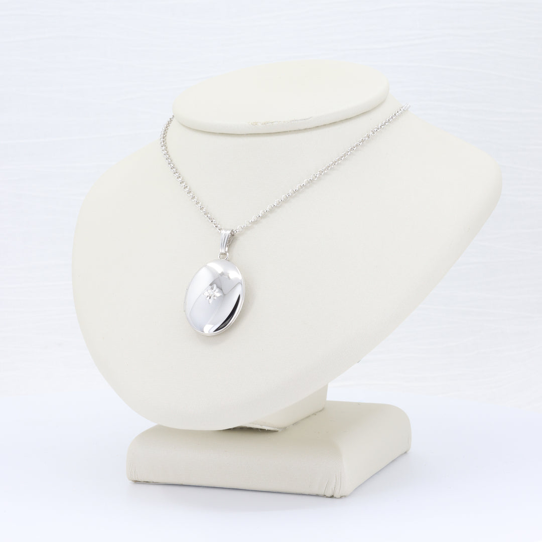 Diamond Oval Locket, 0.01cttw in Sterling Silver, 18 inch Chain