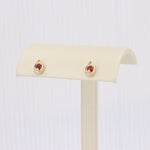 Load image into Gallery viewer, Ruby Teardrop Stud Earrings in Yellow Gold

