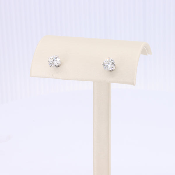 Silver stud earrings featuring sparkling clear cubic zirconia, perfect for elegant day or evening wear.