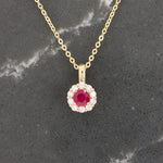 Load image into Gallery viewer, Ruby and Diamond Halo Pendant, 0.32ct Ruby with 0.18cttw Diamond Halo in 14K Yellow Gold, 18 inch Chain - Kizer Cummings Jewelers