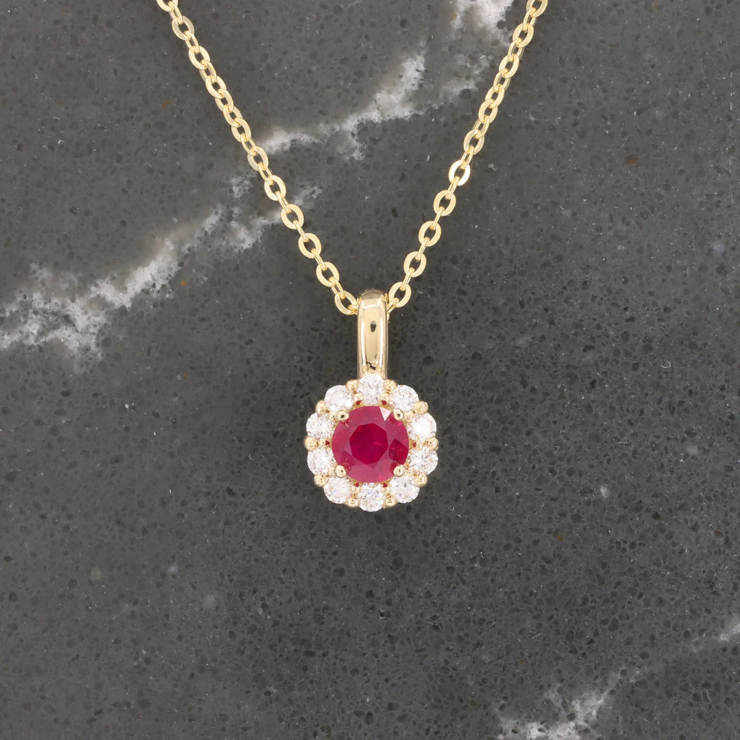 Ruby and Diamond Halo Pendant, 0.32ct Ruby with 0.18cttw Diamond Halo in 14K Yellow Gold, 18 inch Chain - Kizer Cummings Jewelers