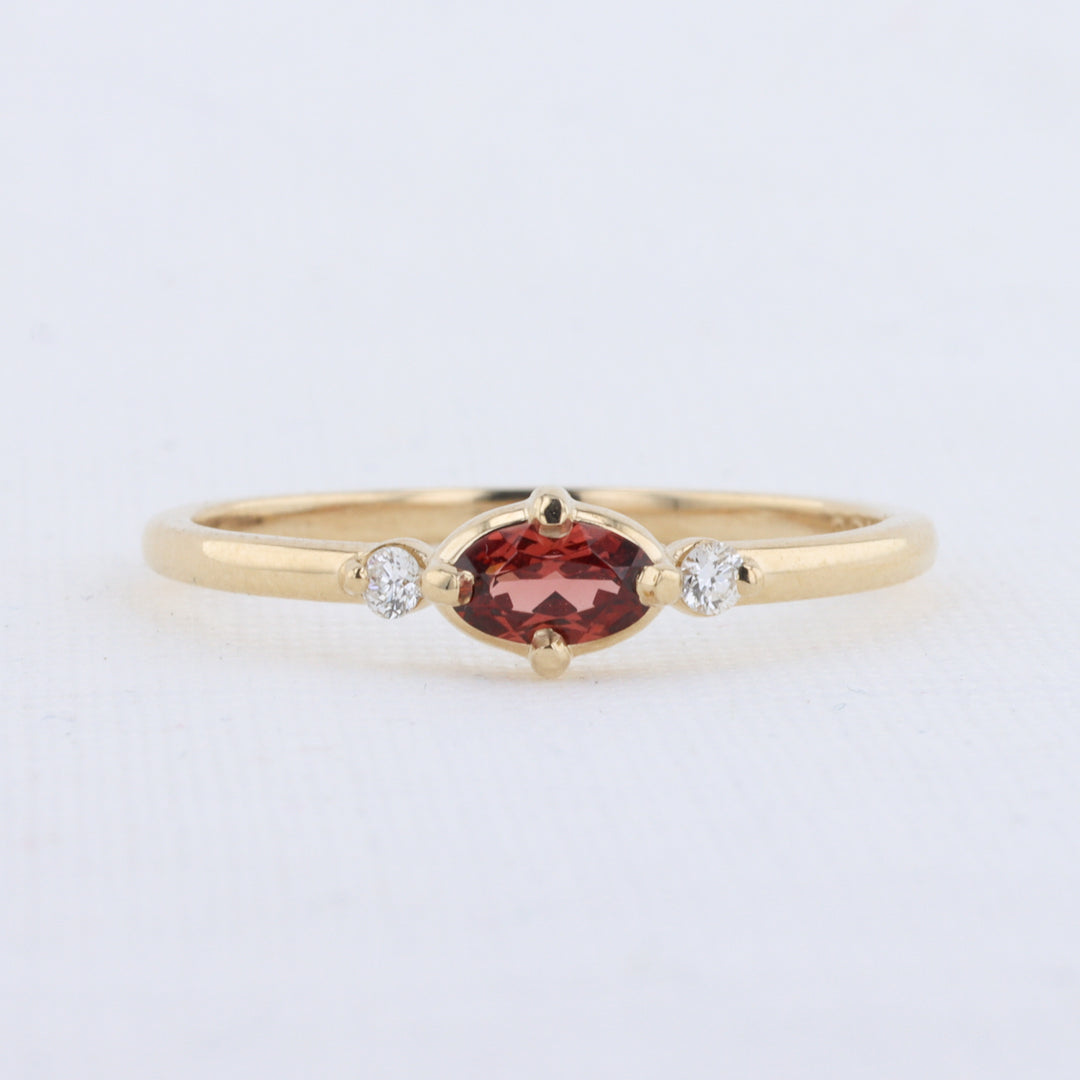 East-West Oval Garnet Ring with Diamond Trim in Yellow Gold