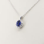 Load image into Gallery viewer, Sapphire and Diamond Halo Pendant, 0.57ct Sapphire and 0.21cttw Diamonds in 14K Yellow Gold, 18 inch Chain
