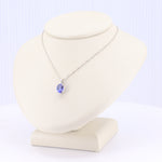 Load image into Gallery viewer, Oval Tanzanite Solitaire Necklace in 14K White Gold
