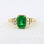 Load image into Gallery viewer, Emerald Ring With Diamond Accents in Yellow Gold
