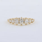 Load image into Gallery viewer, Seven Stone Graduating Oval Diamond Anniversary Ring in Yellow Gold
