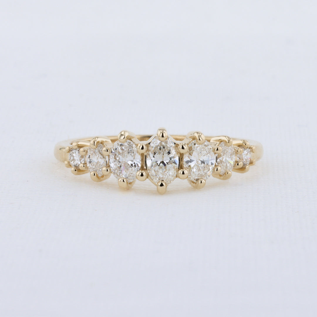 Seven Stone Graduating Oval Diamond Anniversary Ring in Yellow Gold