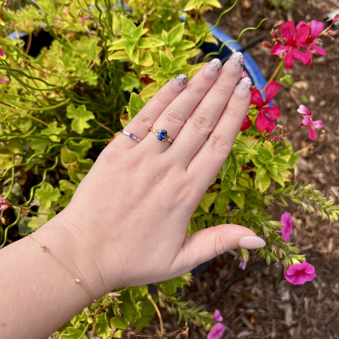 Tanzanite Oval Ring with Leaf Detailing in Yellow Gold