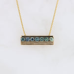 Load image into Gallery viewer, Seven Montana Sapphire Bar Pendant in Yellow Gold
