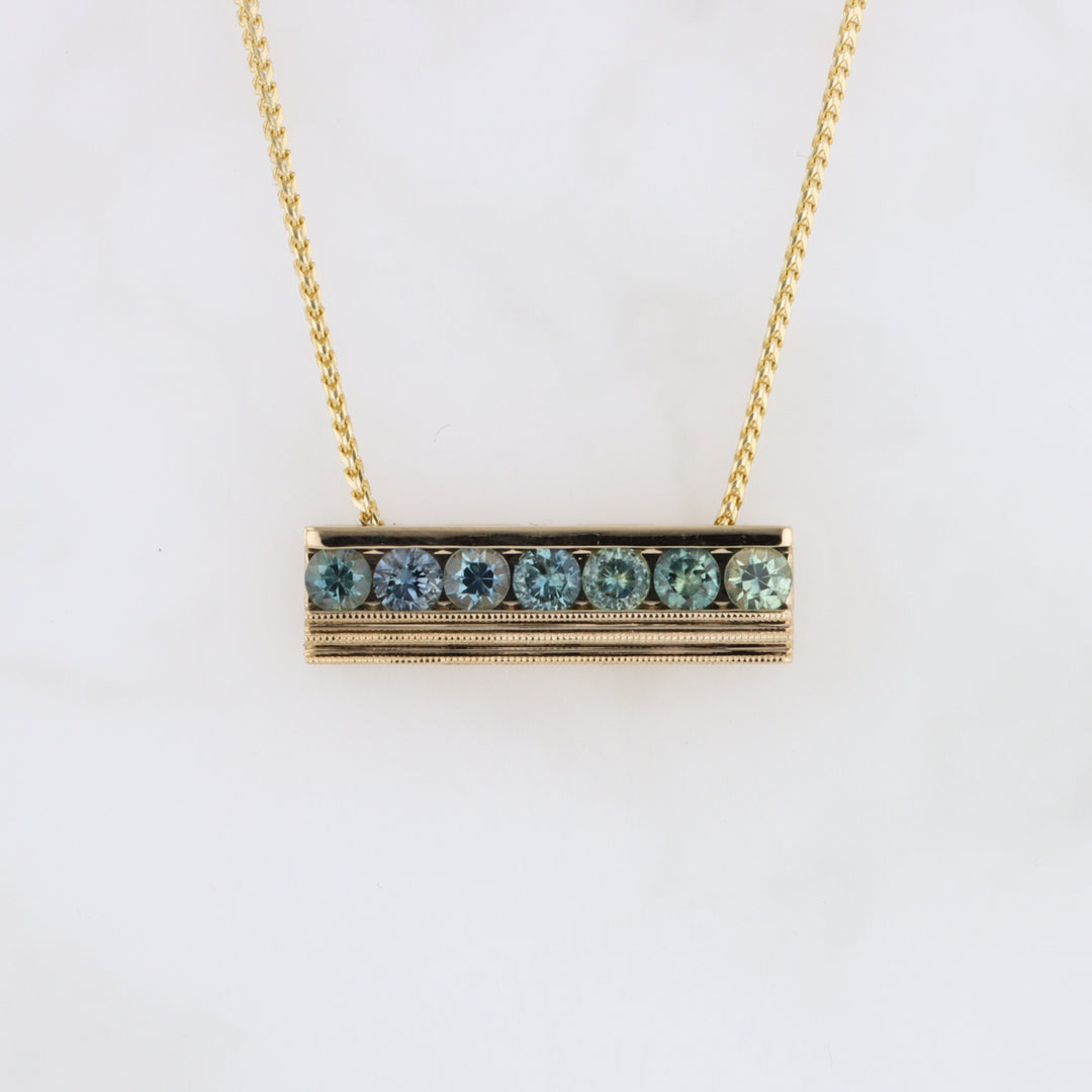 Seven Montana Sapphire Bar Pendant in Yellow Gold