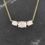 Load image into Gallery viewer, Oval Diamond East West 3 Stone Necklace, 0.44ct Center with 0.18cttw Trim in 14K Yellow Gold, 18 inch - Kizer Cummings Jewelers