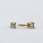 Load image into Gallery viewer, Diamond Stud Earrings in Yellow Gold - 0.12cttw
