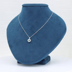 Load image into Gallery viewer, Montana Sapphire and Diamond Halo Pendant, 0.39ct Sapphire and 0.22cttw Diamonds in 14K White Gold, 18 inch Chain