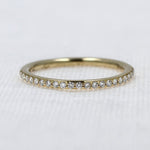 Load image into Gallery viewer, Shared-Prong Diamond Band in Yellow Gold - 0.16cttw
