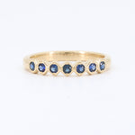 Load image into Gallery viewer, Blue Sapphire Stacking Ring, 0.26cttw Sapphires in 14K Yellow Gold