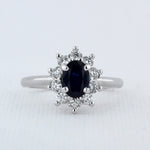 Load image into Gallery viewer, Blue Sapphire and Diamond Halo Ring