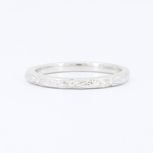Sterling silver floral engraved stacking ring, featuring intricate detailing and a polished finish.