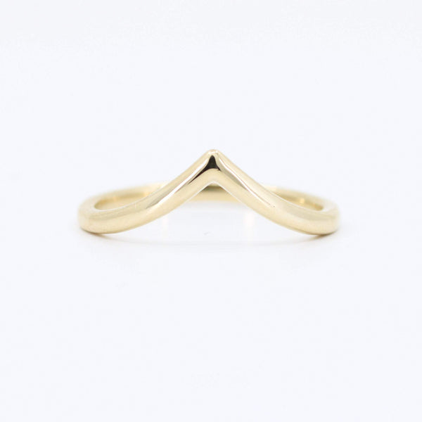 Minimalist gold vermeil v-shaped stacking ring, crafted from durable metal for everyday elegance.