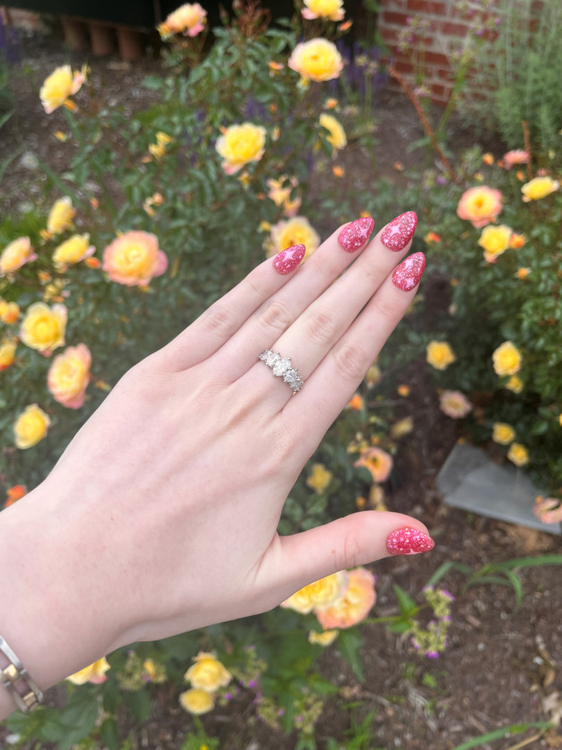 Seven Stone Oval Anniversary Band set in Platinum