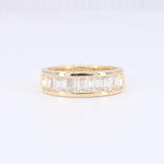 Load image into Gallery viewer, Seven Stone Emerald Cut Diamond Channel Band in Yellow Gold
