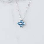 Load image into Gallery viewer, London Blue Topaz Quatrefoil Pendant in White Gold
