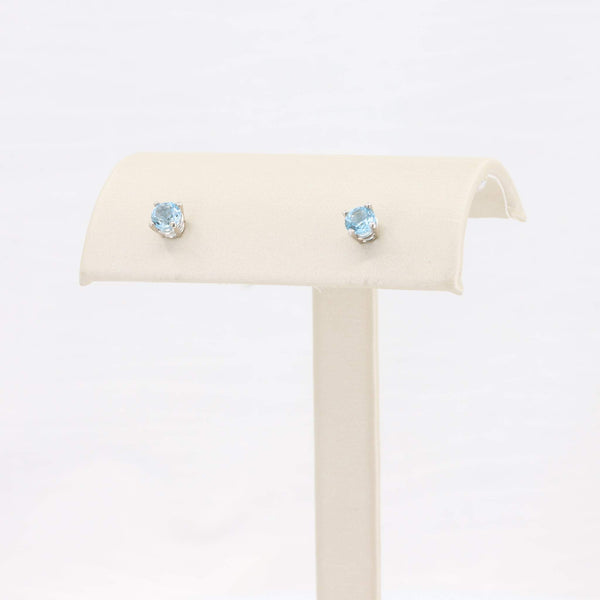 Light blue aquamarine stud earrings set in sterling silver, elegant and perfect for everyday wear.