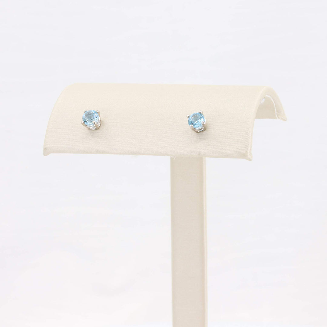 Light blue aquamarine stud earrings set in sterling silver, elegant and perfect for everyday wear.