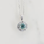 Load image into Gallery viewer, Montana Sapphire and Diamond Halo Pendant, 0.39ct Sapphire and 0.22cttw Diamonds in 14K White Gold, 18 inch Chain